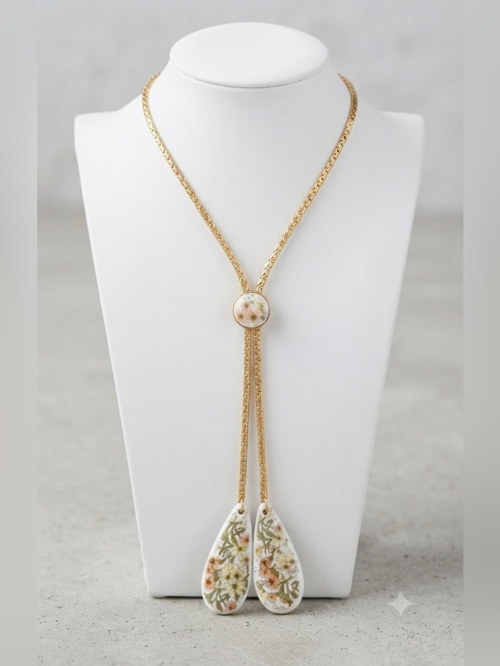 Vintage floral bolo tie with gold tone chain